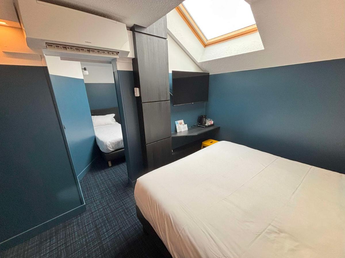 Un ou plusieurs lits dans un hébergement de l'établissement Sure Hotel by Best Western Annecy