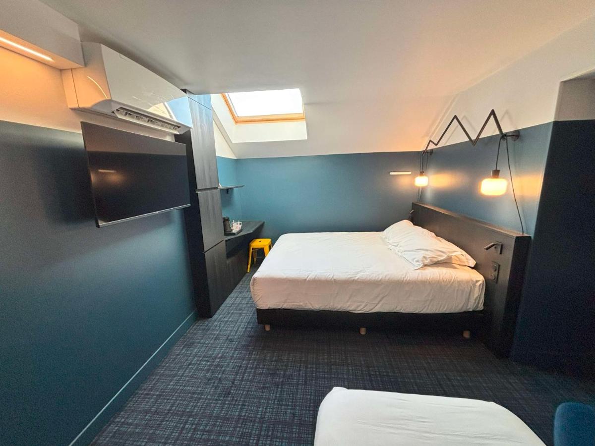 Un ou plusieurs lits dans un hébergement de l'établissement Sure Hotel by Best Western Annecy