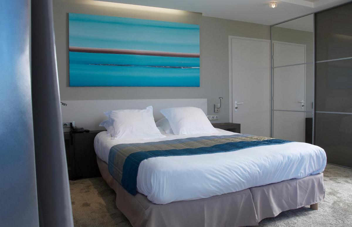 Un ou plusieurs lits dans un hébergement de l'établissement Hostellerie de la Pointe Saint-Mathieu - SPA & Restaurant