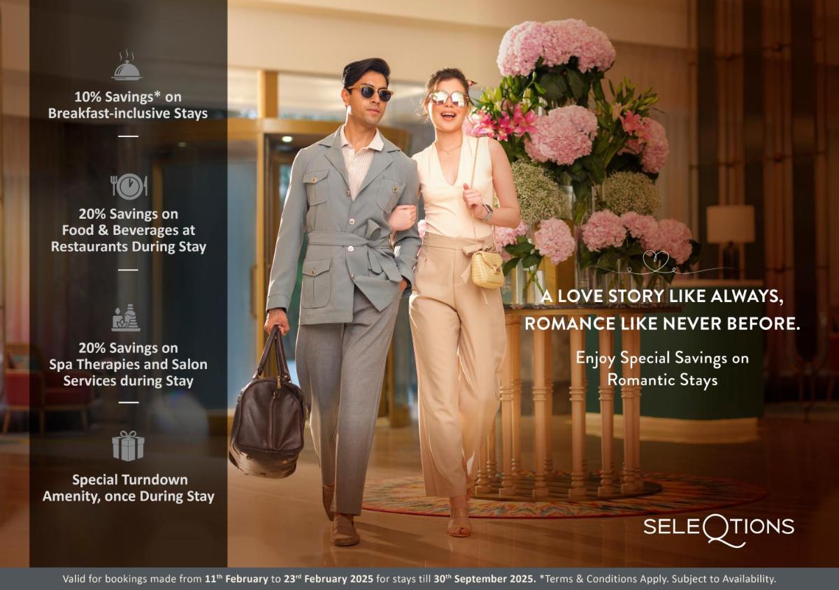 a man and a woman standing next to a bouquet of flowers at Savoy - IHCL SeleQtions in Ooty