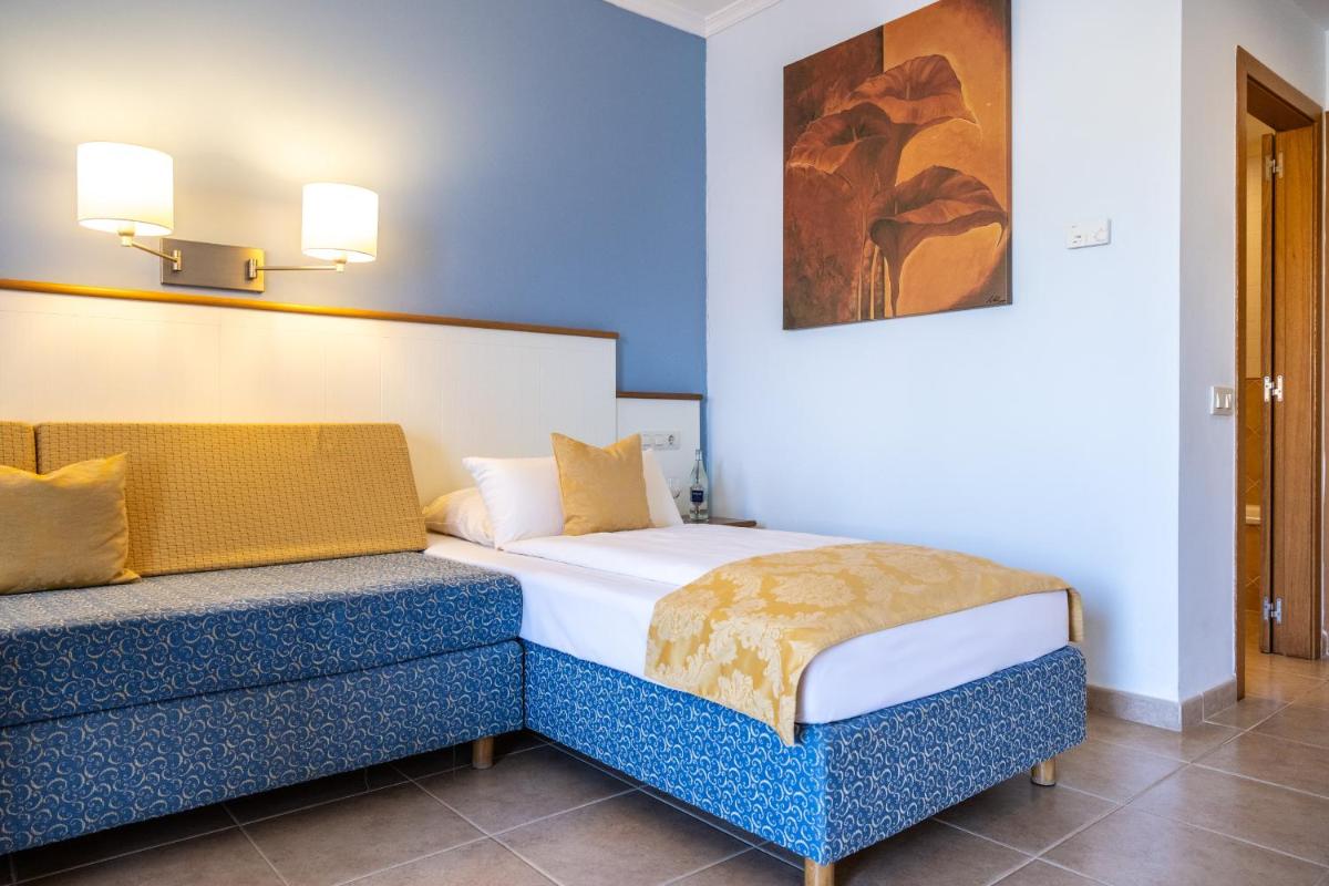 Cama o camas de una habitación en Luz Del Mar