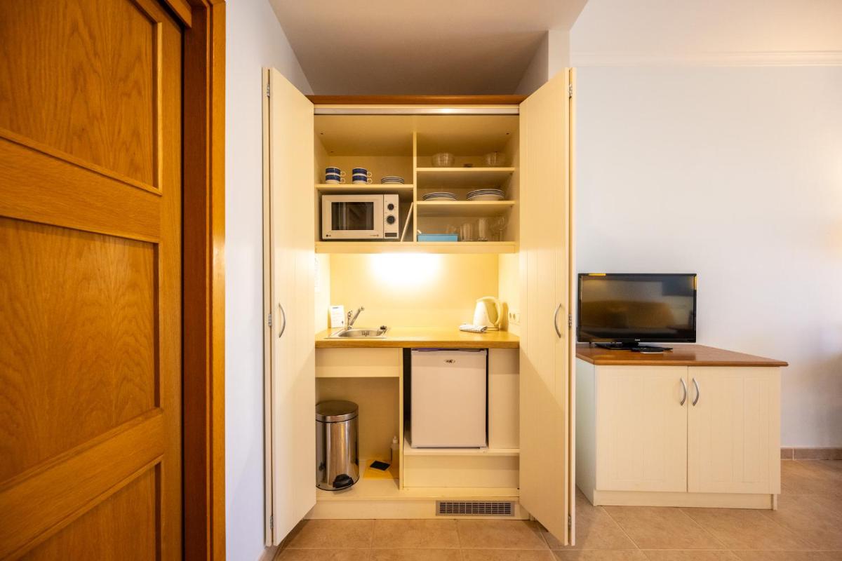 Una cocina o zona de cocina en Luz Del Mar