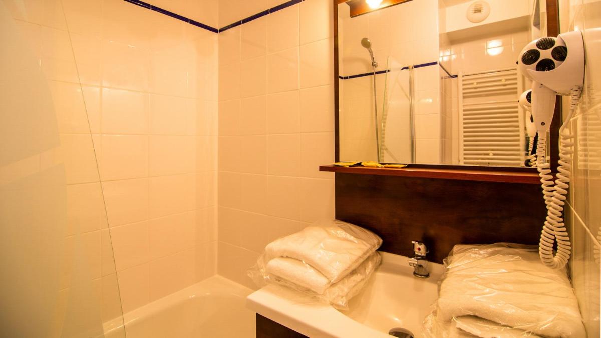Salle de bains dans l'établissement Vacancéole - Appart'Vacances Pyrénées 2000