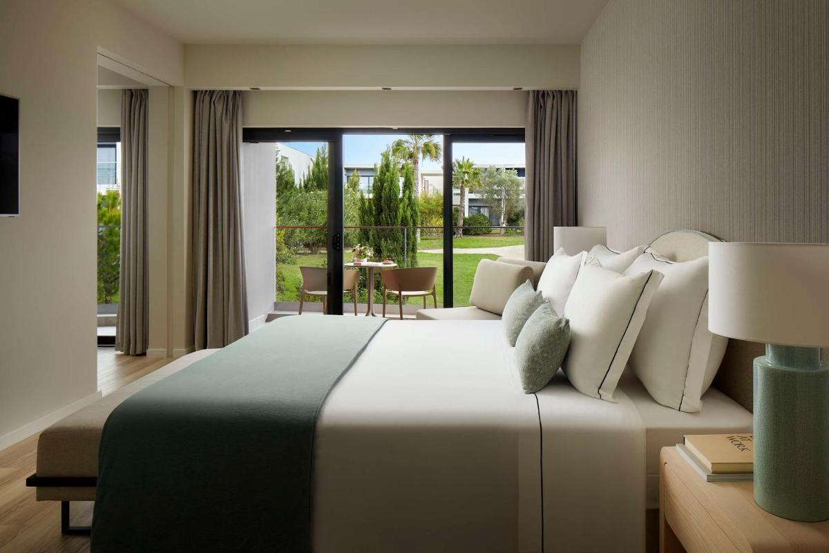 Uma cama ou camas num quarto em Tivoli Alvor Algarve - All Inclusive Resort