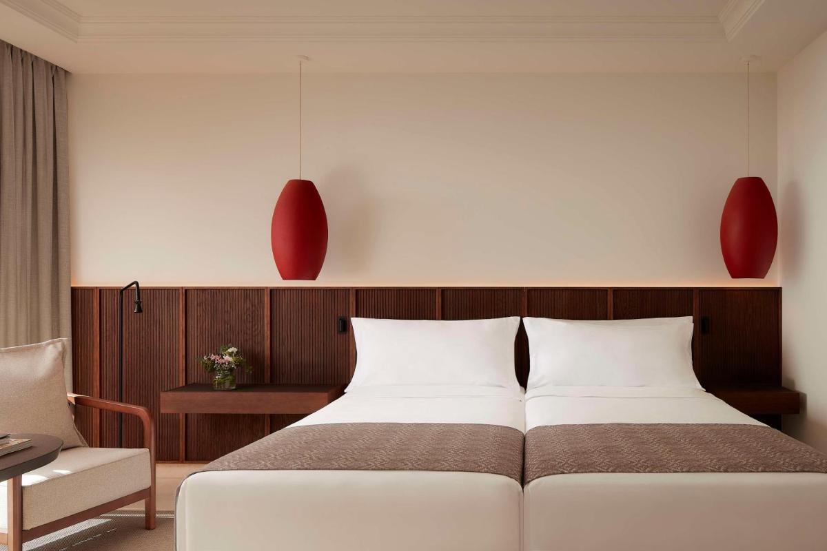 Cama o camas de una habitación en Tivoli La Caleta Resort