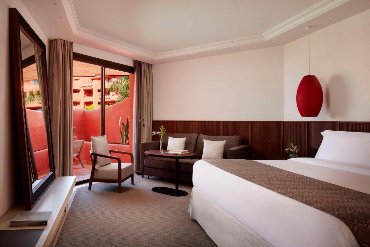 Cama o camas de una habitación en Tivoli La Caleta Resort