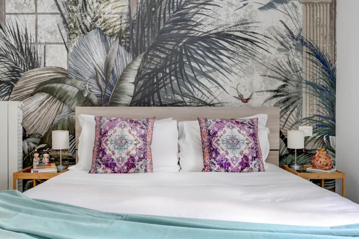 Santi Quattro Apartment & Rooms - Colosseo - Housity