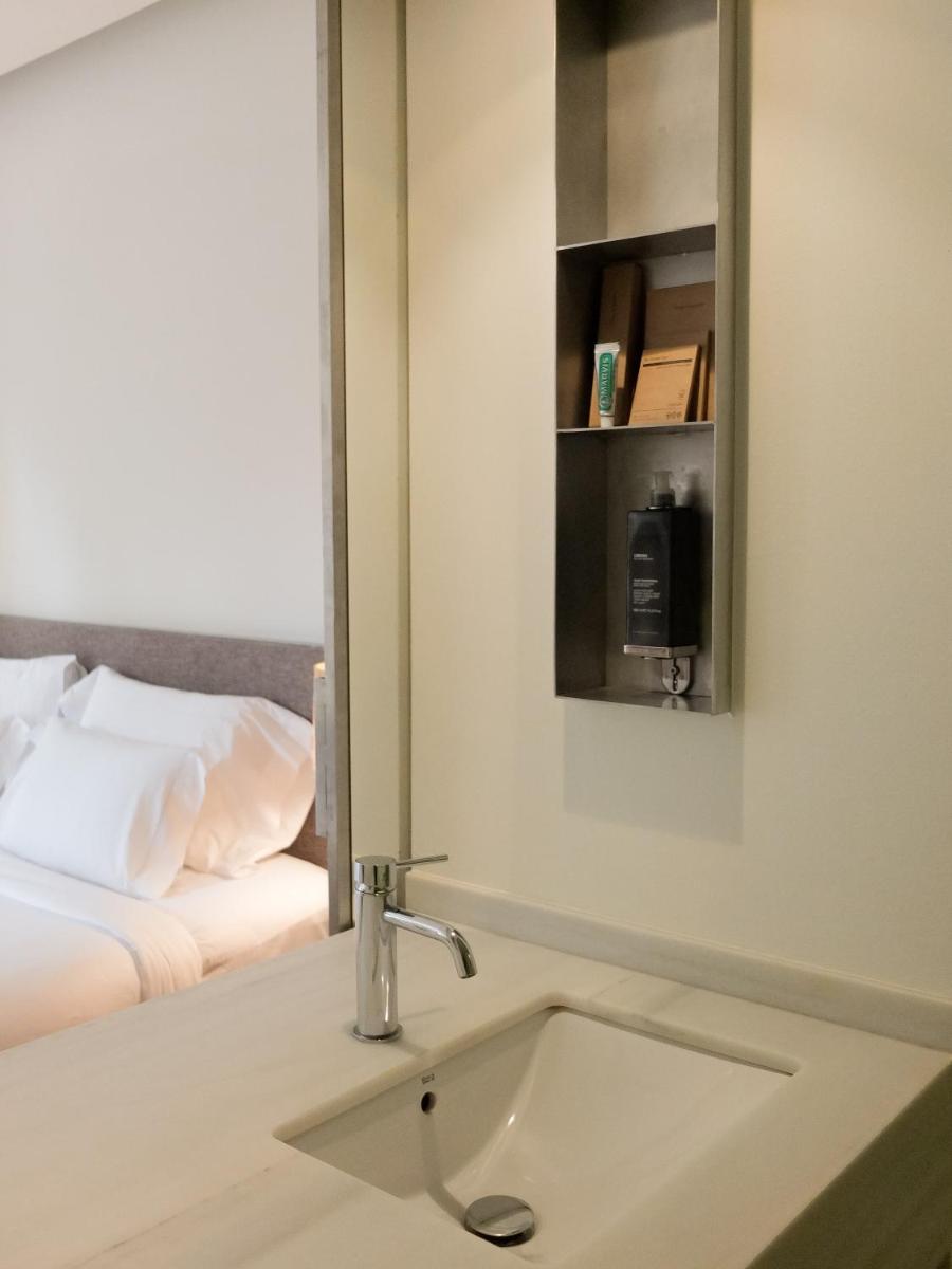 Cama o camas de una habitación en Hostal Empúries