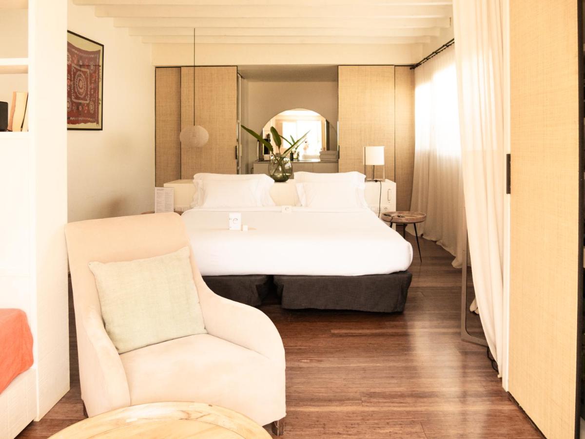 Cama o camas de una habitación en Hostal Empúries