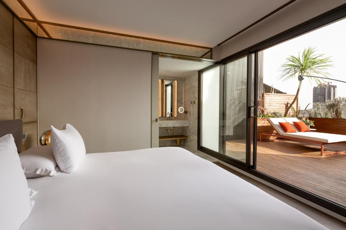 Cama o camas de una habitación en Almanac Barcelona