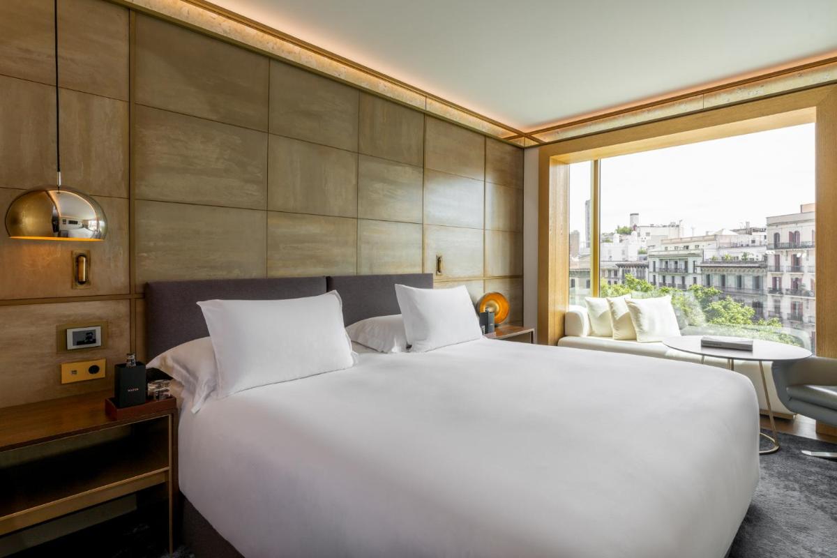Cama o camas de una habitación en Almanac Barcelona