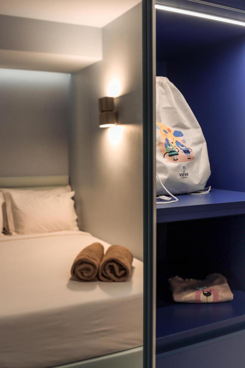 Uma cama ou camas num quarto em The Views Oasis