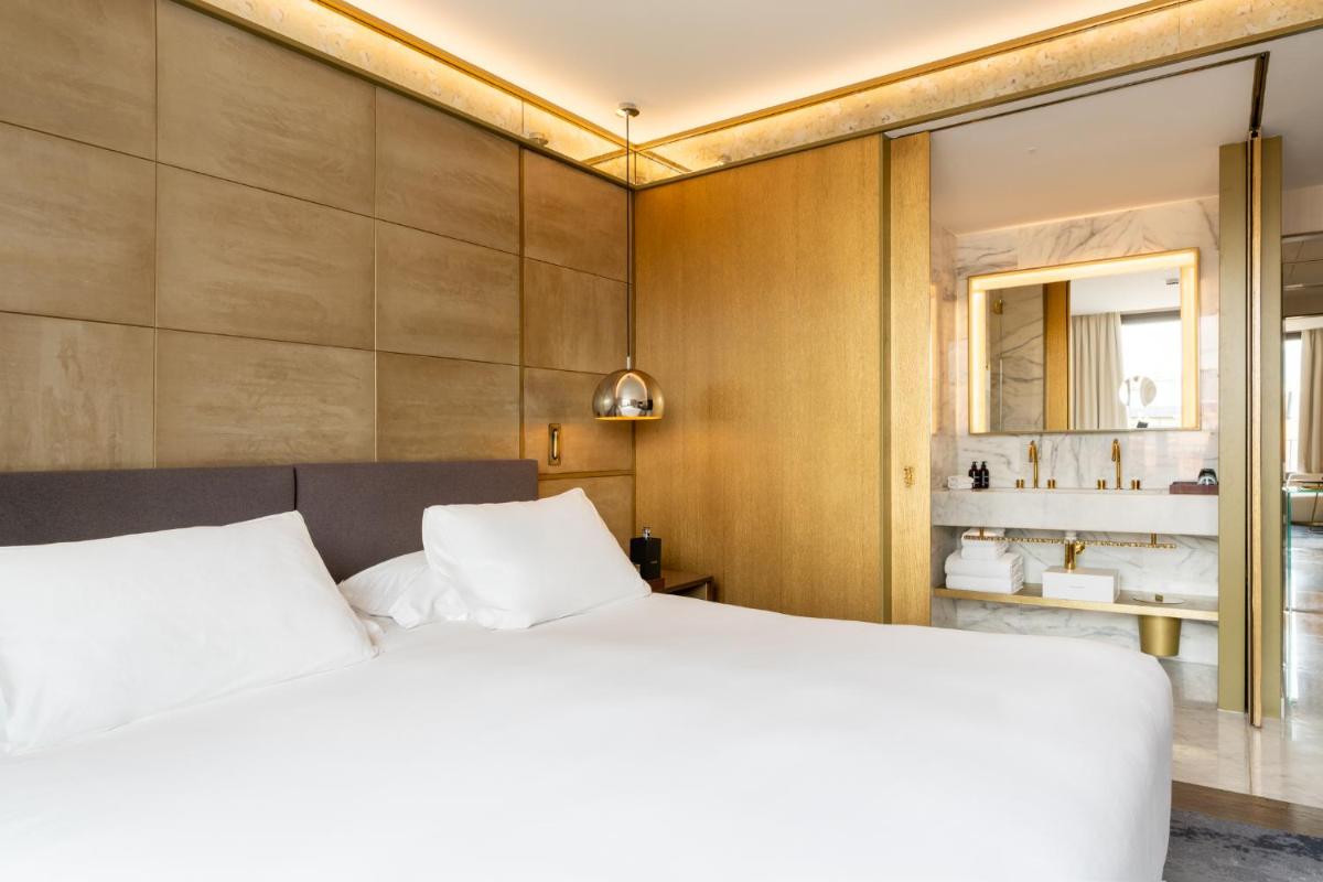 Cama o camas de una habitación en Almanac Barcelona