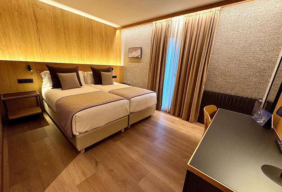 Cama o camas de una habitación en Hotel Petit Lacreu