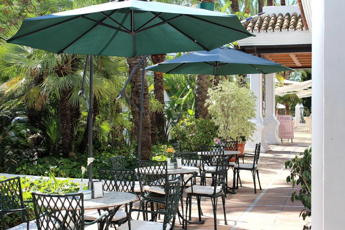 Jardín al aire libre en Aparthotel Monarque Sultán