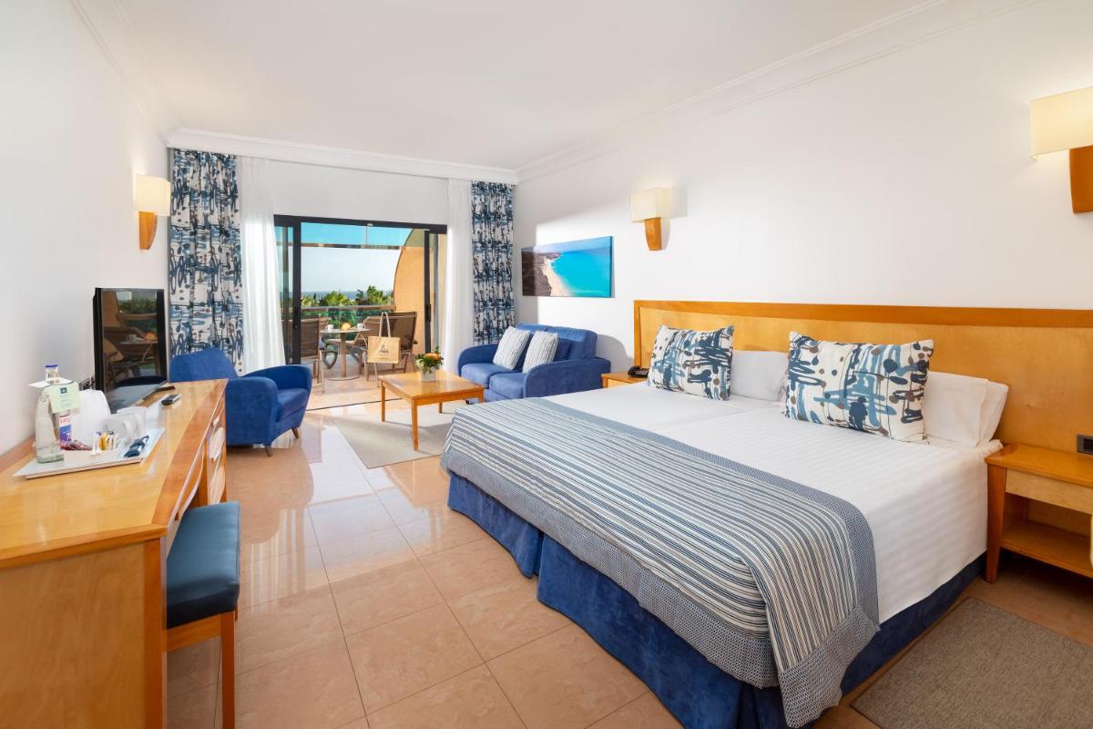 Cama o camas de una habitación en MUR Faro Jandia Fuerteventura & Spa