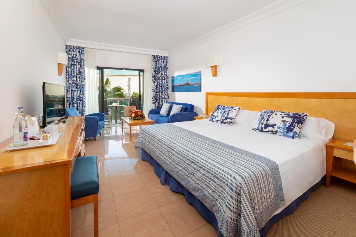 Cama o camas de una habitación en MUR Faro Jandia Fuerteventura & Spa