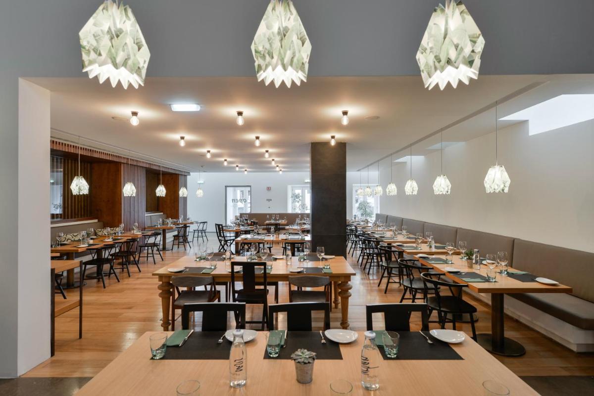 Um restaurante ou outro lugar para comer em Inspira Liberdade Boutique Hotel