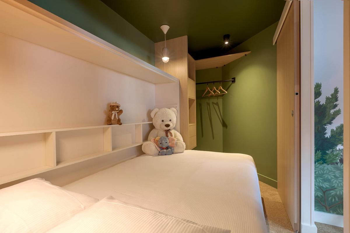 Un ou plusieurs lits dans un hébergement de l'établissement Lykke Hôtel & Spa Chamonix - ex Mercure