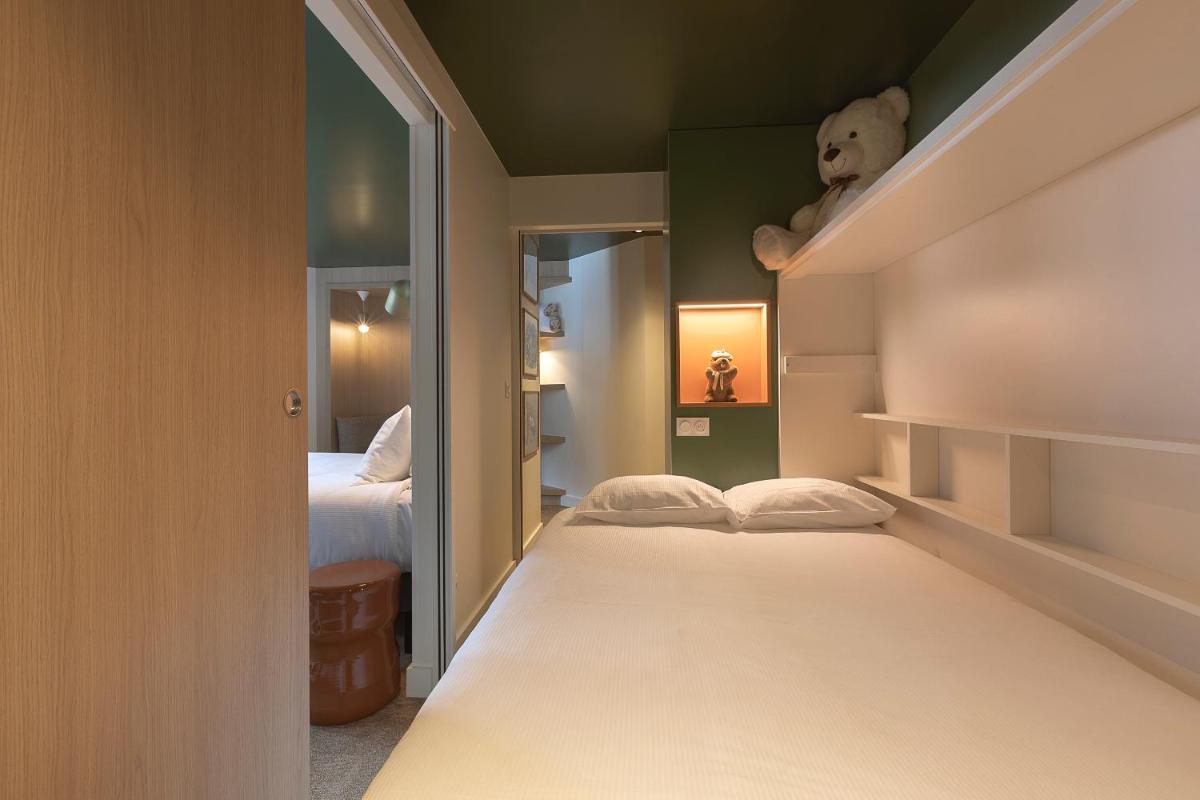 Un ou plusieurs lits dans un hébergement de l'établissement Lykke Hôtel & Spa Chamonix - ex Mercure