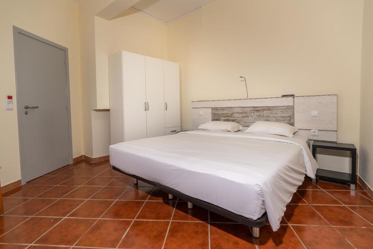 Uma cama ou camas num quarto em TarmarPlace