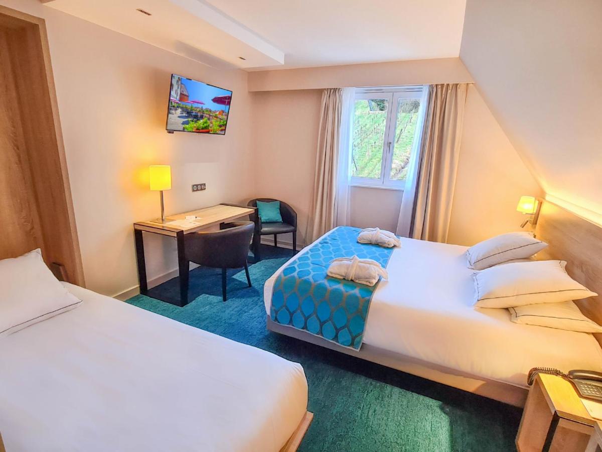 Un ou plusieurs lits dans un hébergement de l'établissement Best Western Plus Hotel & SPA Le Schoenenbourg