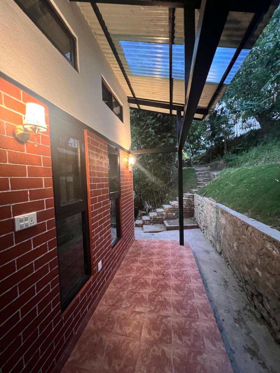 Avocado Accommodations - One Bedroom Premium Cottage overlooking Shivapuri Mountain - Housity