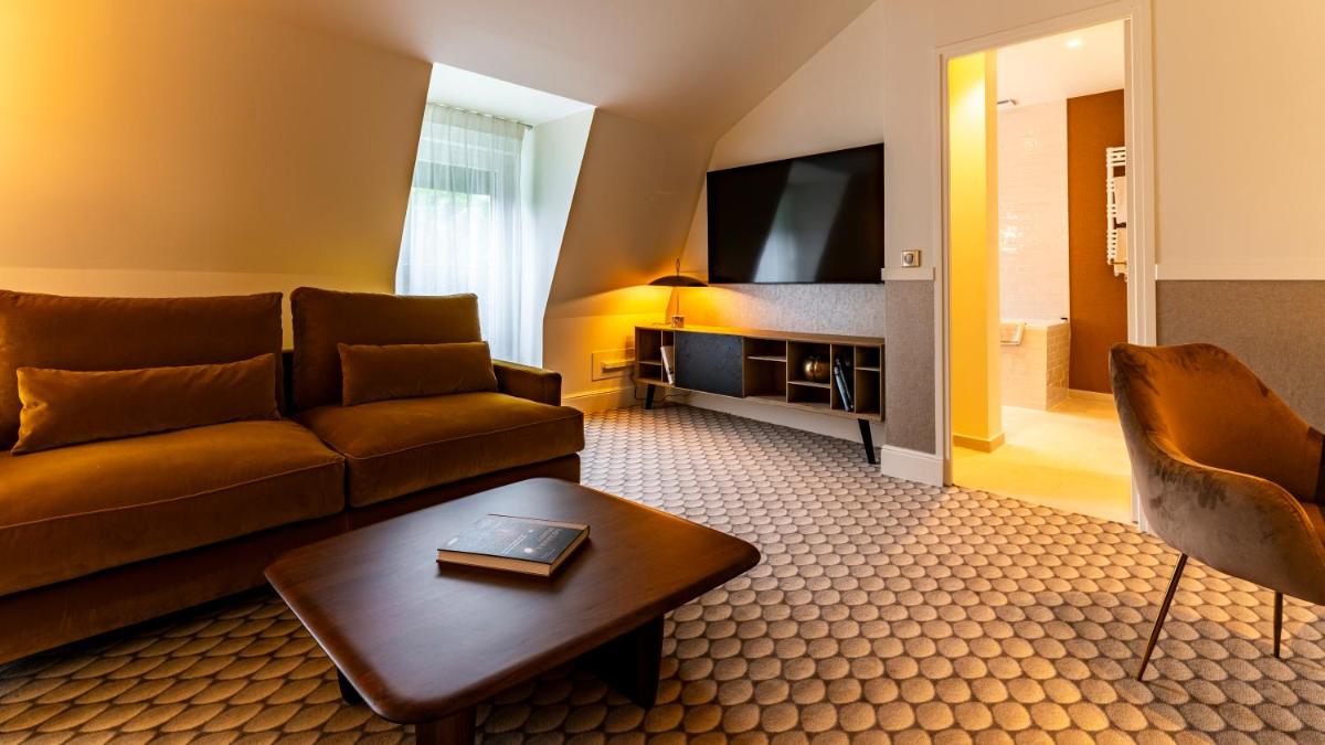 Télévision ou salle de divertissement dans l'établissement Continental Hotel
