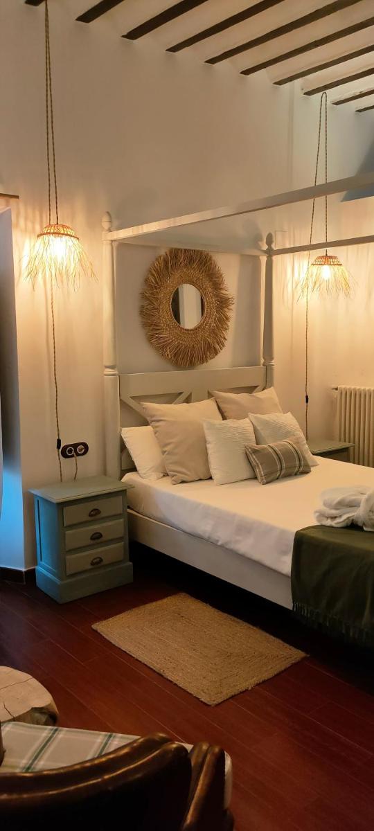Cama o camas de una habitación en Hotel La Casa del Canónigo