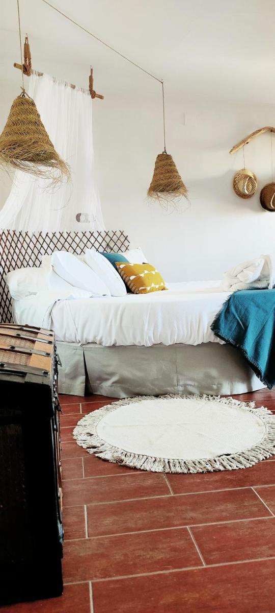 Cama o camas de una habitación en Hotel La Casa del Canónigo