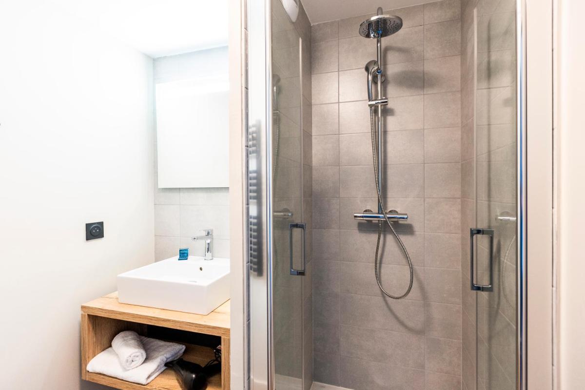 Salle de bains dans l'établissement Résidence Club MMV Le Silvana