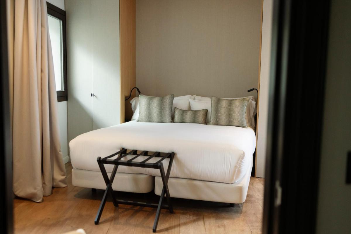 Cama o camas de una habitación en Hotel Boutique Sidonia
