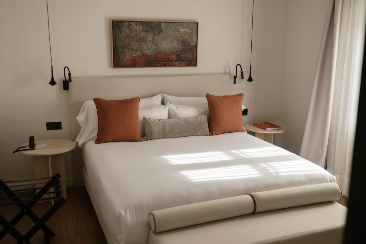 Cama o camas de una habitación en Hotel Boutique Sidonia