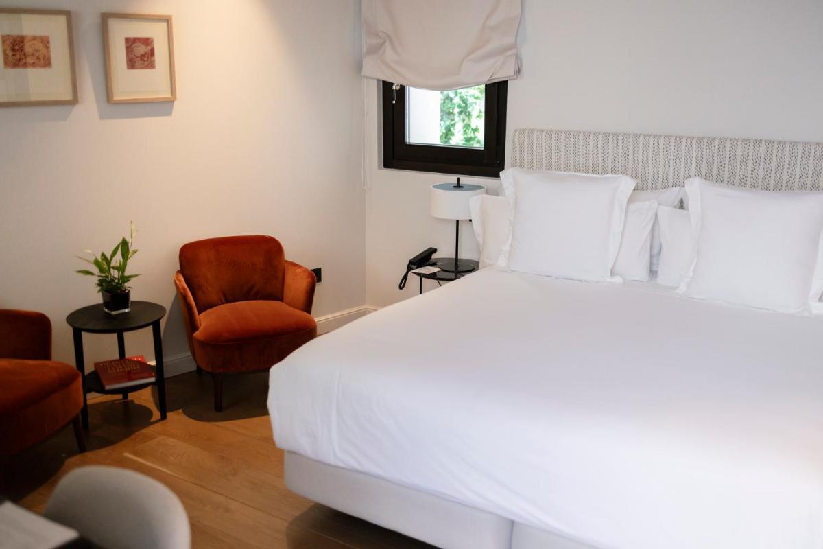 Cama o camas de una habitación en Hotel Boutique Sidonia