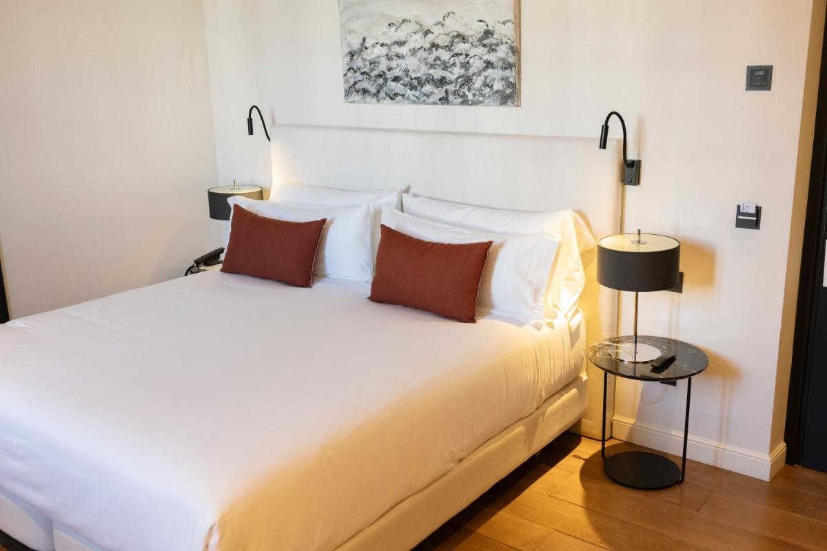 Cama o camas de una habitación en Hotel Boutique Sidonia
