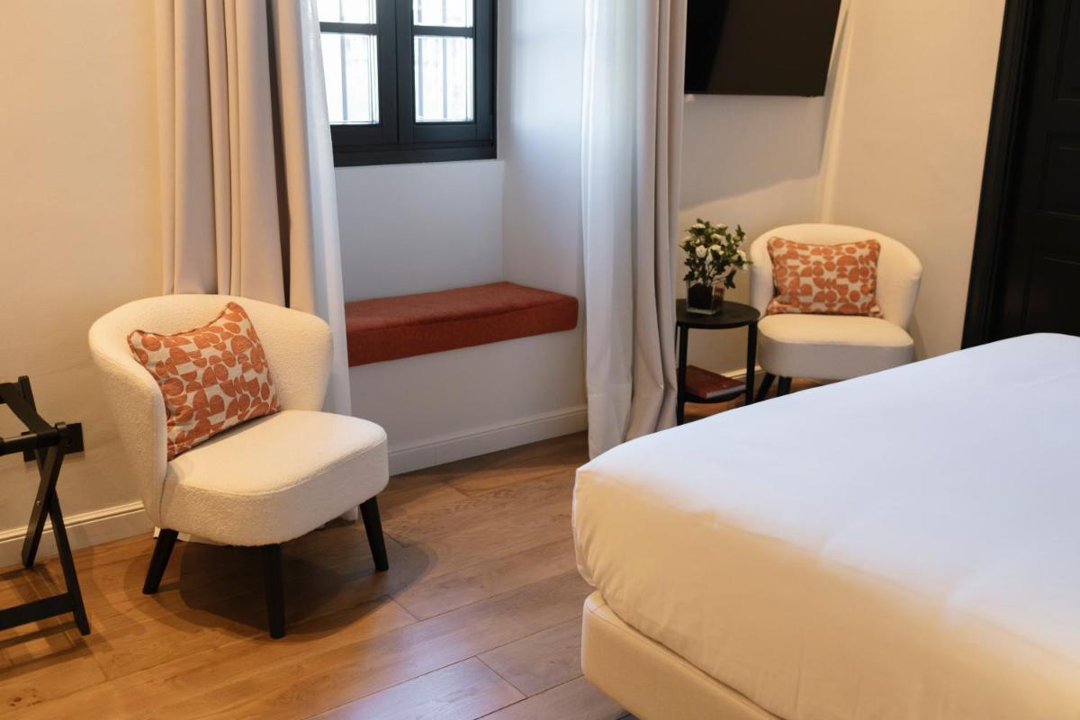 Cama o camas de una habitación en Hotel Boutique Sidonia