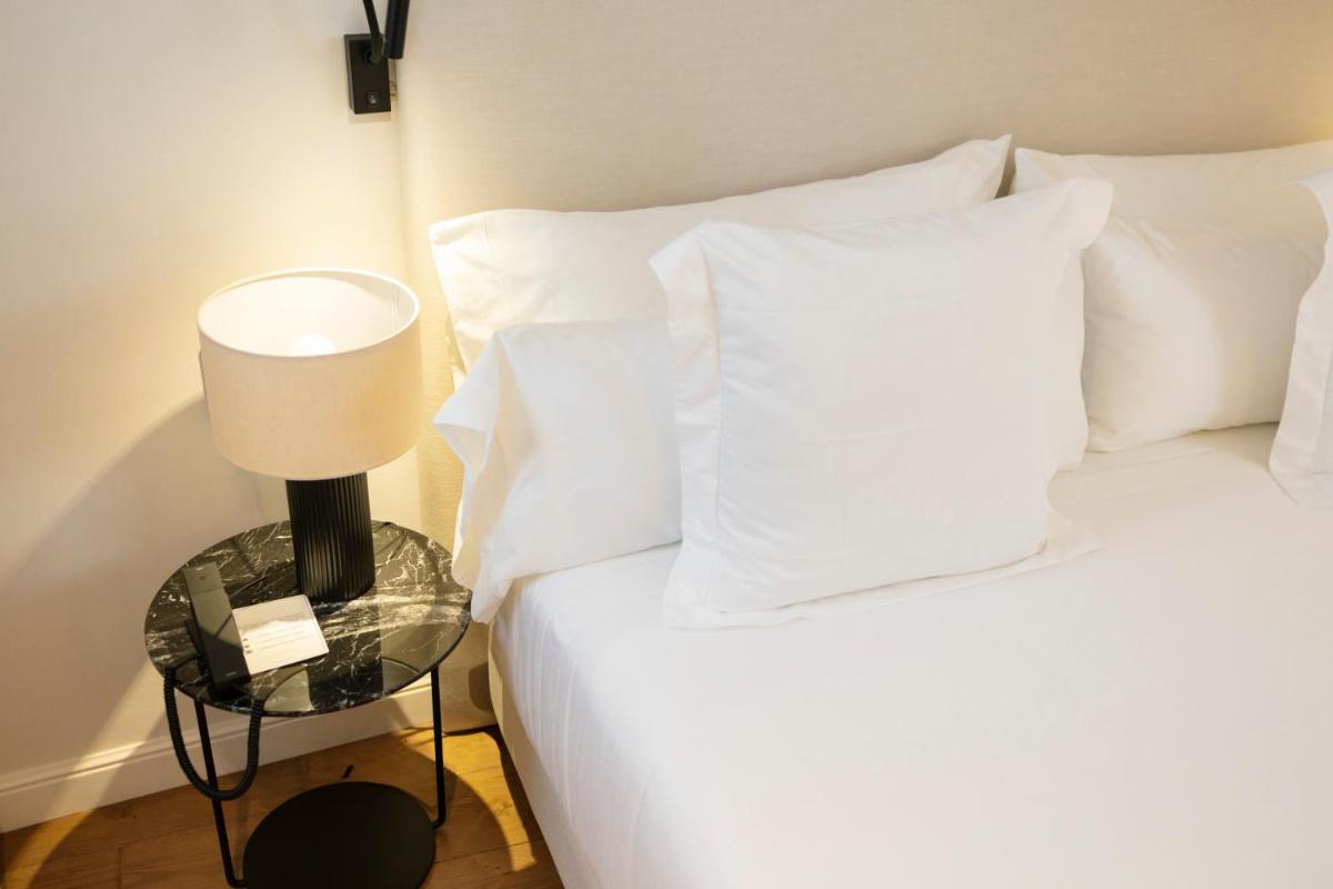 Cama o camas de una habitación en Hotel Boutique Sidonia