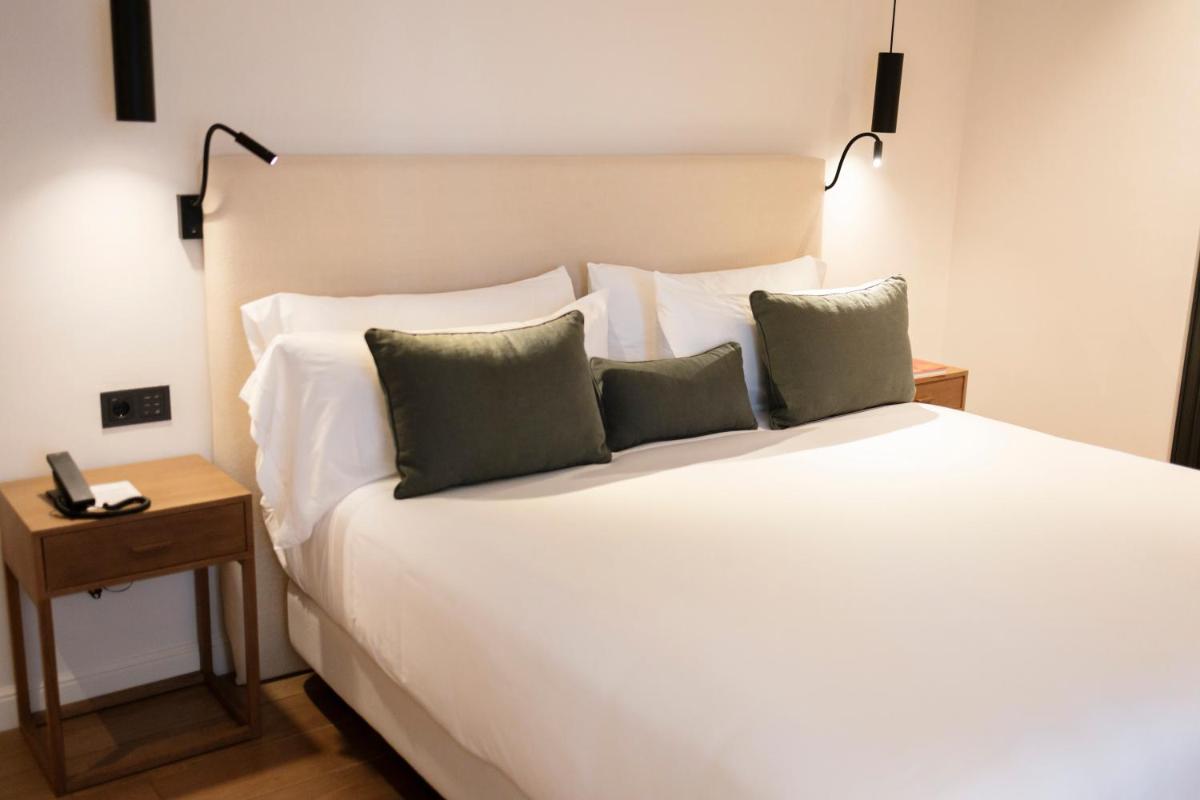 Cama o camas de una habitación en Hotel Boutique Sidonia