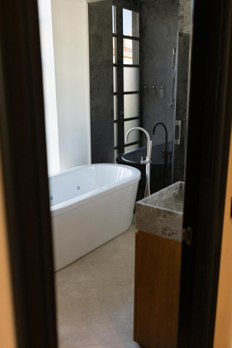 Un baño de Hotel Boutique Sidonia