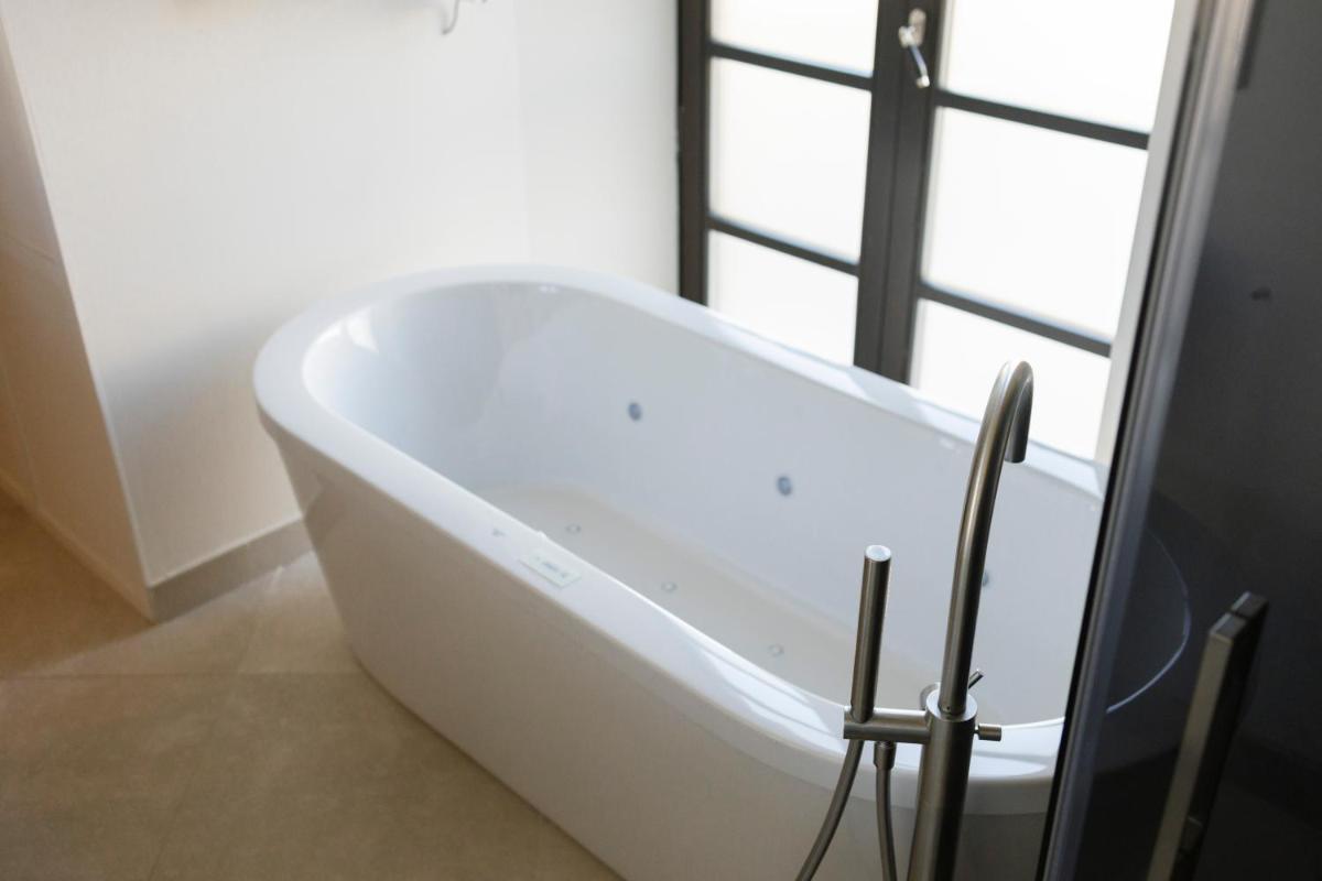 Un baño de Hotel Boutique Sidonia