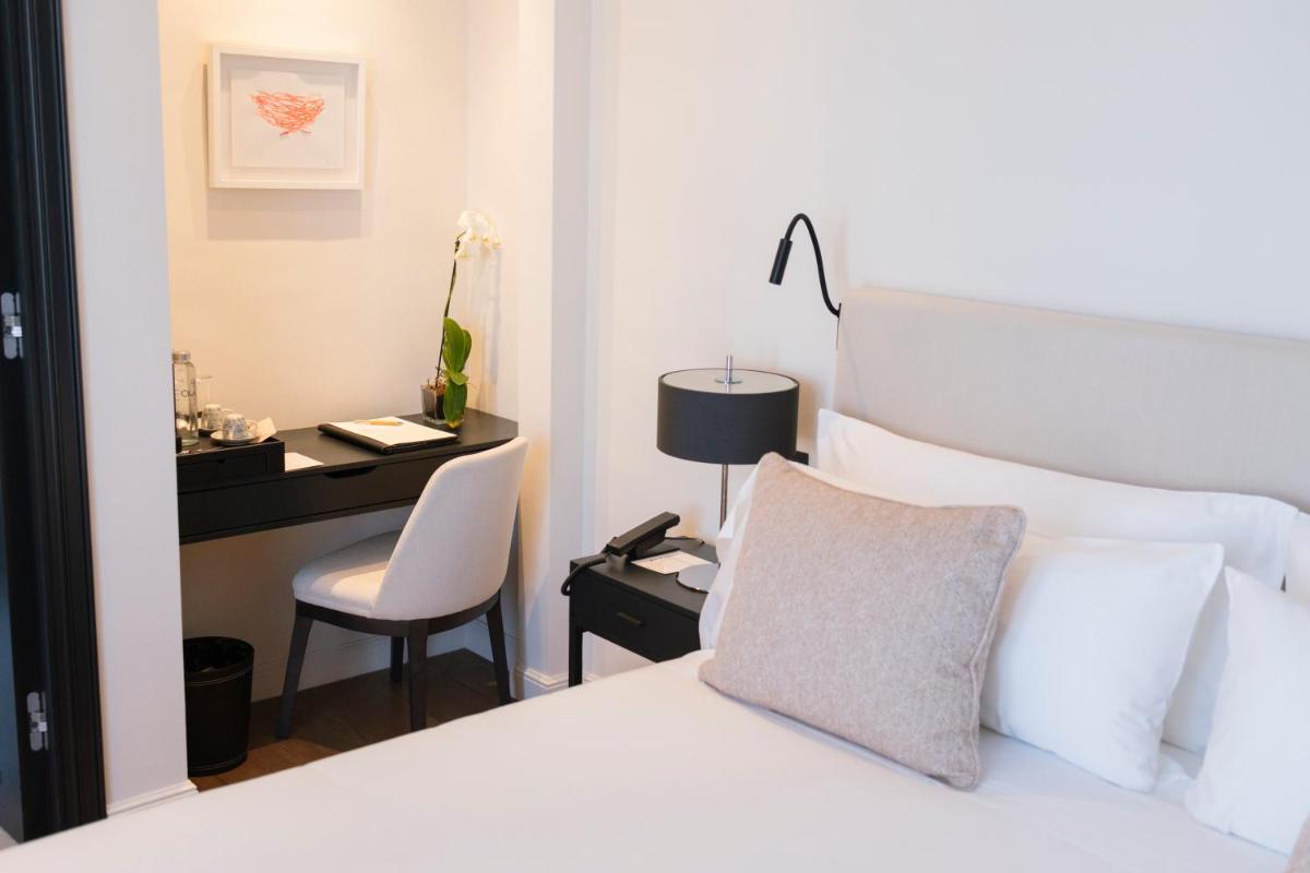 Cama o camas de una habitación en Hotel Boutique Sidonia