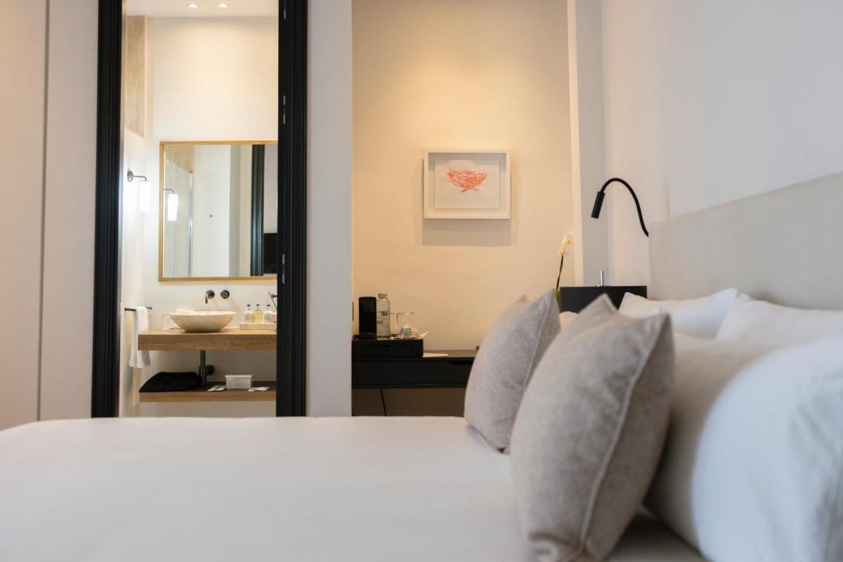 Cama o camas de una habitación en Hotel Boutique Sidonia