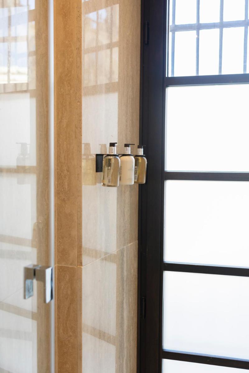 Un baño de Hotel Boutique Sidonia