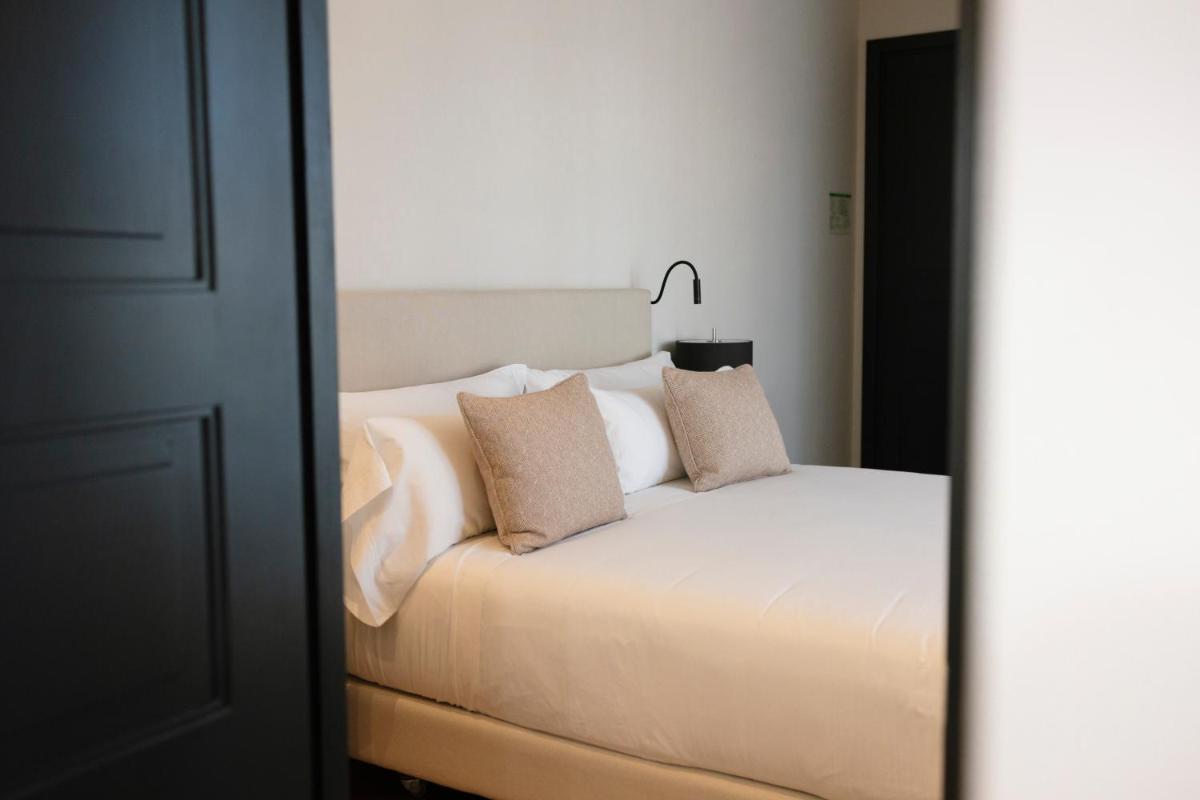 Cama o camas de una habitación en Hotel Boutique Sidonia