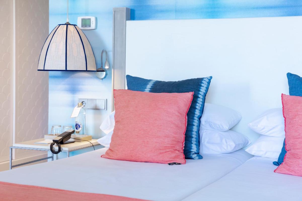 Cama o camas de una habitación en Hotel Honucai