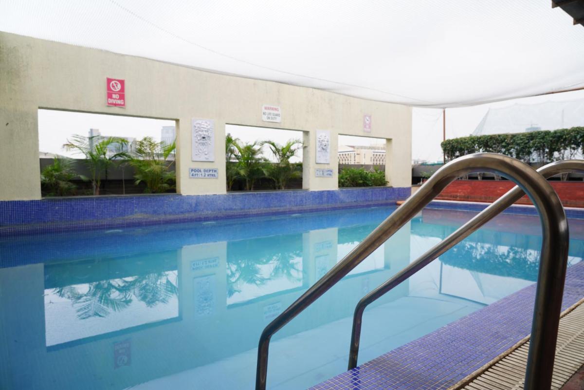 a swimming pool at a hotel at Fortune Select JP Cosmos, Bengaluru - Member ITC Hotels' Group in Bengaluru