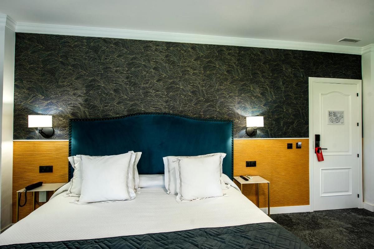 Cama o camas de una habitación en Hotel Tamisa Golf