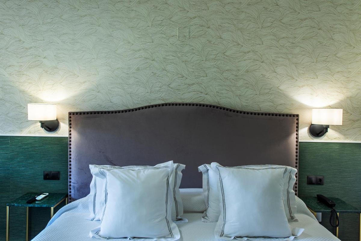 Cama o camas de una habitación en Hotel Tamisa Golf