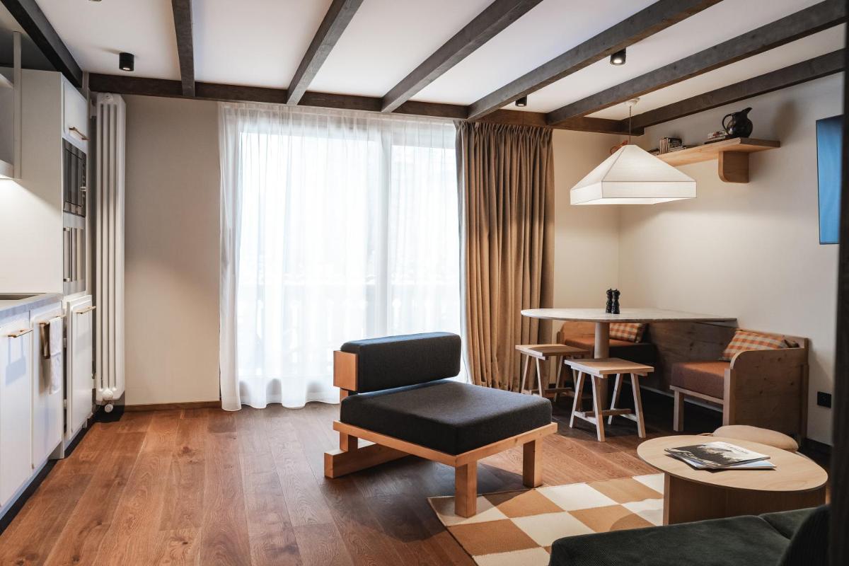 Coin salon dans l'établissement Appartements de l'Héliopic