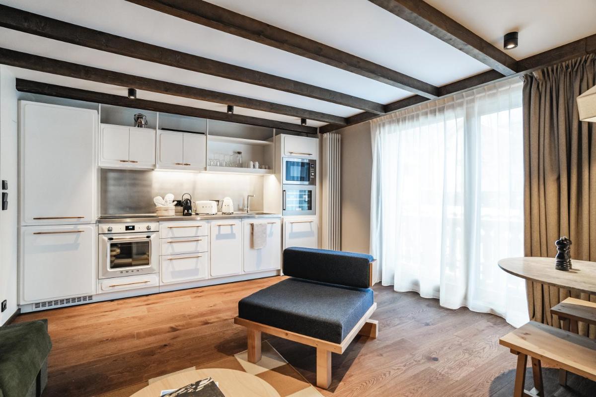 Cuisine ou kitchenette dans l'établissement Appartements de l'Héliopic